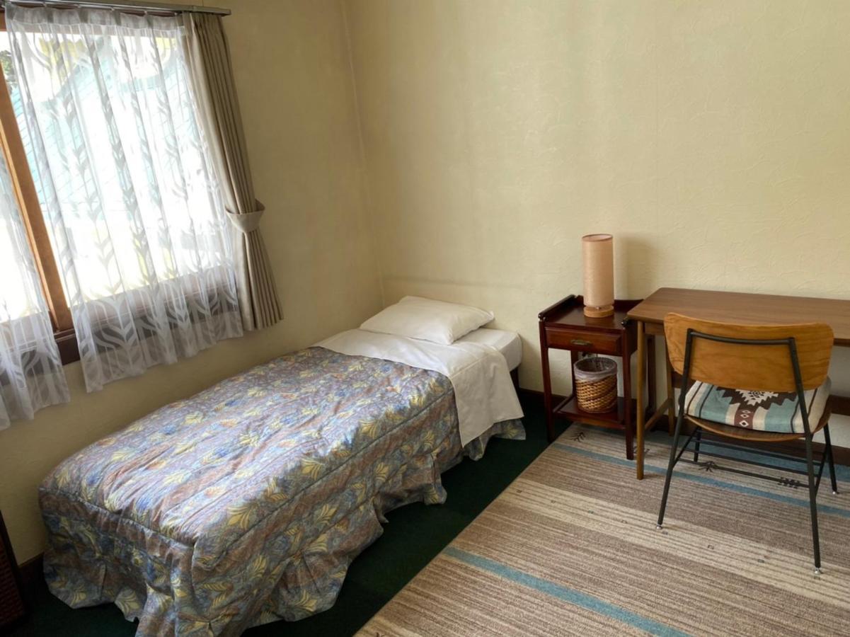 Guest House Wind Inn Hakuba Buitenkant foto