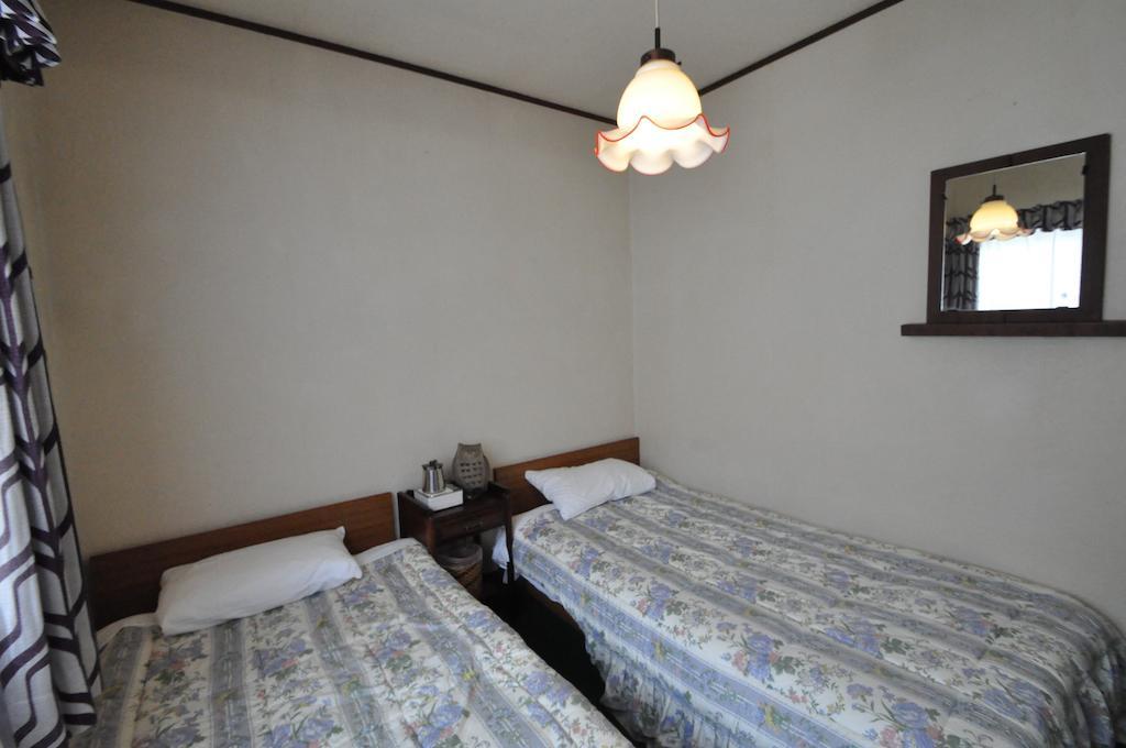 Guest House Wind Inn Hakuba Kamer foto